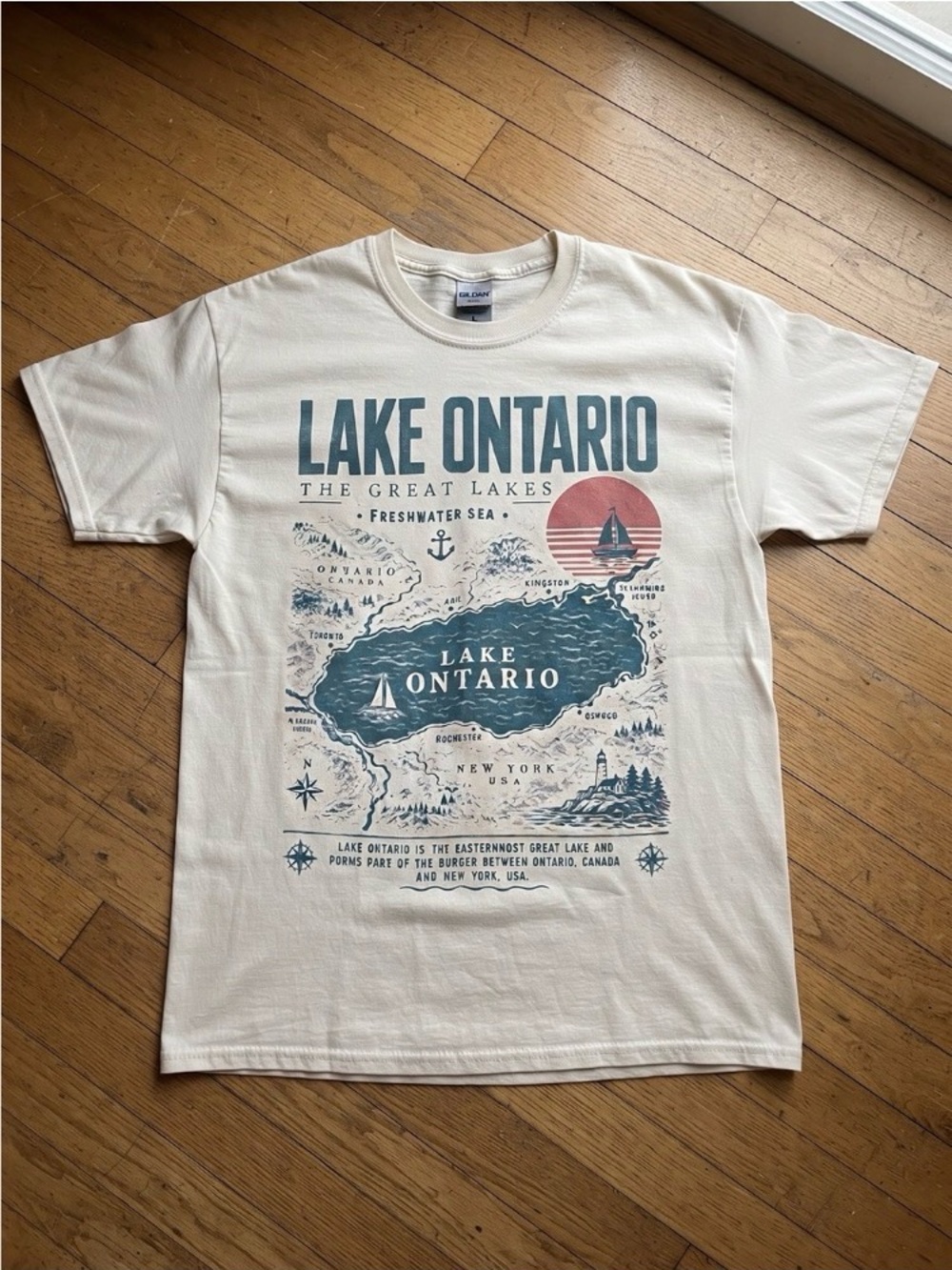 White Lake Ontario Graphic Tee with Blue and Rust Print